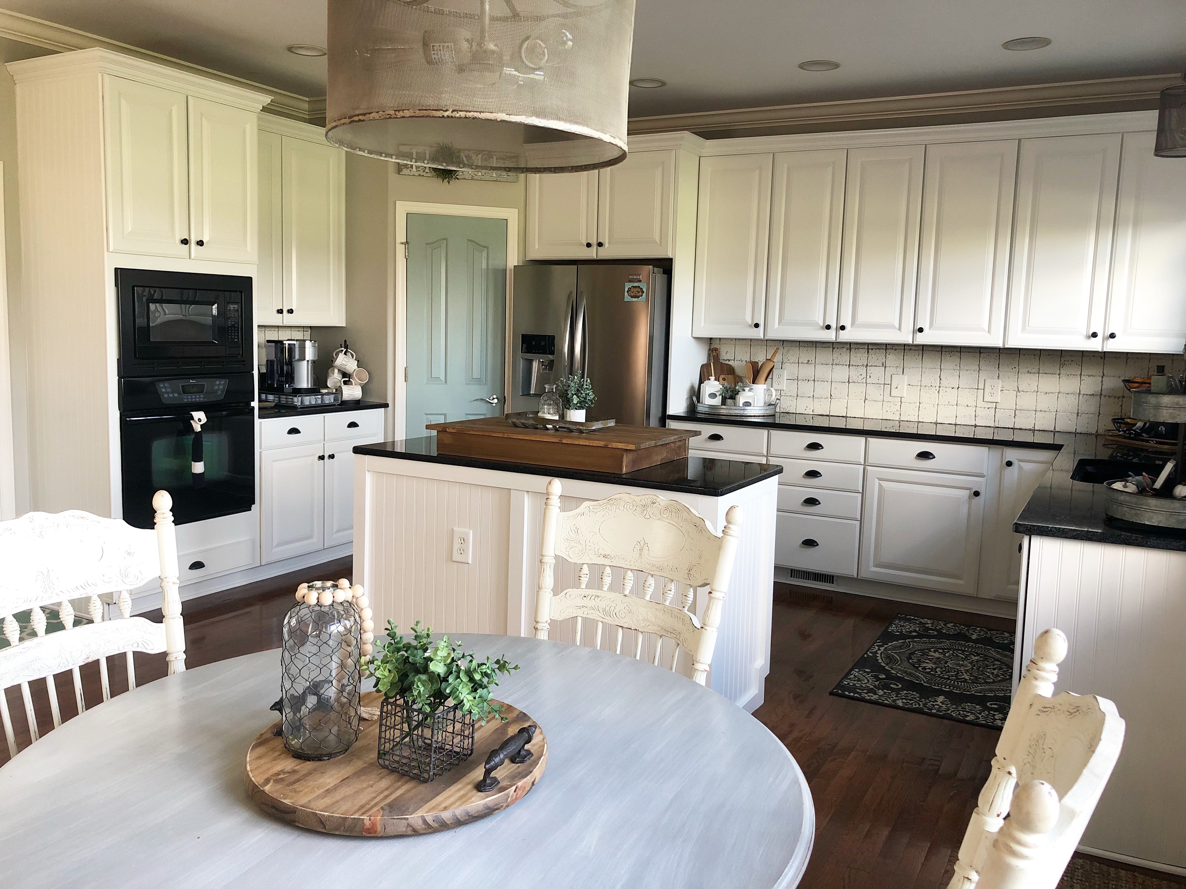 My Painted Kitchen Cabinet Makeover From Brown To White For A Fresh New Look  